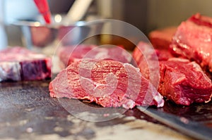 Argentinean raw beef steak meat is cut, sliced