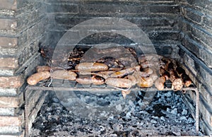 Argentinean roast made in a homemade barbecue in AlmuÃÂ±ecar photo