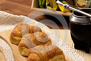 Argentinian breakfast. Three Croissants. Preparation mate.