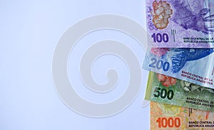 Argentinian money with white background photo