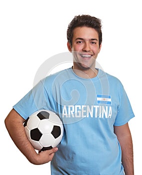 Argentinian soccer fan is happy about a goal