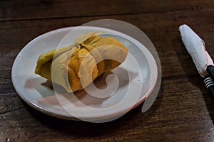 Argentinian tamale or humita on a di photo