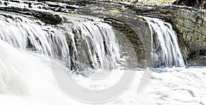 Argillilte waterfall on the mountain river