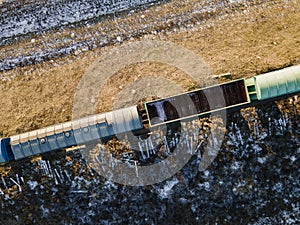Ð¡argo trains. Wagons with goods on railroad. Heavy industry. Industrial conceptual scene. Aerial. Top view. Vintage style