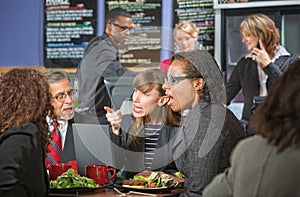 Arguing Executives in Cafeteria