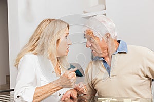 An arguing senior couple