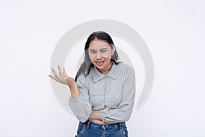 An argumentative and opinionated young woman vehemently opposing a proposal. Looking a bit offended. Isolated on a white photo