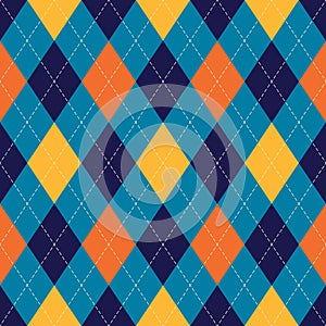 Argyle pattern colorful in navy blue, orange, yellow. Seamless stitched rhombus vector graphic for spring autumn winter socks.