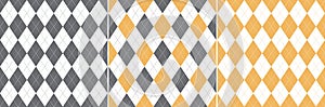 Argyle pattern seamless in grey, yellow, white. Vector geometric stitched argyll dark background graphic set for spring gift paper