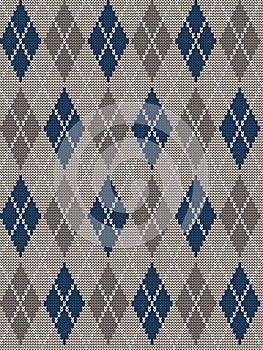 Seamless knitted pattern with rhombuses. Checkered background in beige, brown and blue colors
