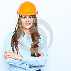 Arhcitect business woman standing against white wall with cross