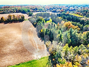 Arial veiw of fields and autumn trees.