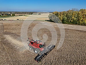 Arial view of a combine harvesting soy beans
