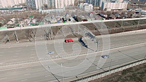 An arial view of commuters in cars as they drive down the busy street