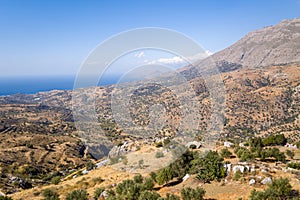 The arid countryside in the south of the island , in Europe, Greece, Crete, towards Preveli, By the Mediterranean sea, in summer,