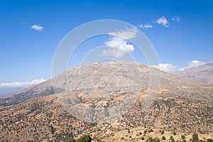 The arid countryside in the south of the island , in Europe, Greece, Crete, towards Preveli, By the Mediterranean sea, in summer,