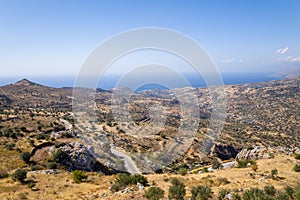 The arid countryside in the south of the island , in Europe, Greece, Crete, towards Preveli, By the Mediterranean sea, in summer,