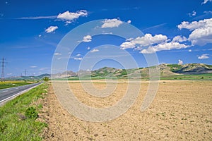 Arid field and hill panorama