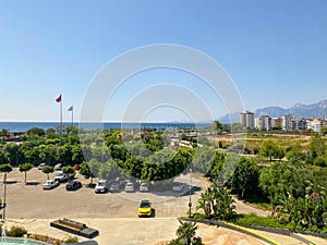 Ariel panoramic view of old city and skyscrapers with the sea from the mountains