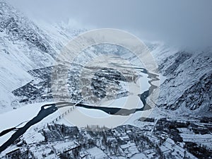 Ariel shot of Gojal Valley Upper Hunza Gilgit Baltistan northern Pakistan covered in snow during winter