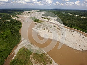 Ariel view of a muddy river in the Peruvian jungle photo