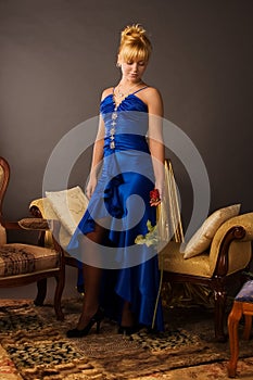 Aristocratic lady in a dark blue dress