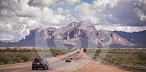 Arizona desert road leading to Superstition Mountain near Phoenix,Az,USA