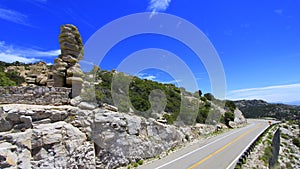 Arizona Highway with deep blue sky and geologic formation