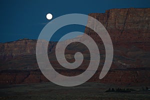 Arizona moon setting over Vermillion Cliffs