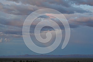 Arizona Vermillion Cliffs Sunset with spiral cloud