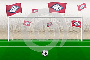 Arkansas football team fans with flags of Arkansas cheering on stadium, penalty kick concept in a soccer match