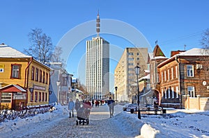 Arkhangelsk, Russia, February, 20, 2018. People walking on prospect of Chumbarov-Luchinsky in the evening in winter in Arkhangel