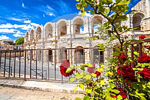 Arles Amphitheatre and colorful street architecture view photo