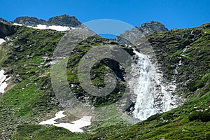 Arlhoehe - A waterfall in high Alps