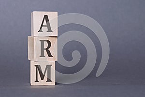 ARM - acronym from wooden blocks with letters, Advanced RISC Machine