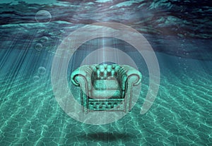 Arm chair floats in sea bottom