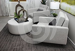 Arm Chairs & Ottoman In Home Sitting Area