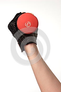 Arm holding a three pound weight