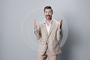 arm man happy male beige suit winner hand businessman business victory