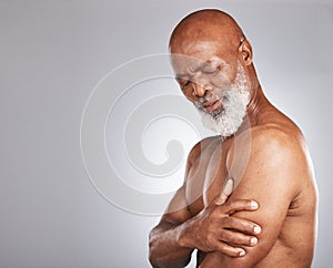Arm pain, injury and senior black man with muscle inflammation, body accident and broken bone on studio background