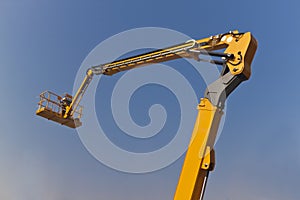 The Arm and Platform of Yellow Picker