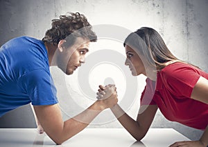 Arm wrestling between a couple