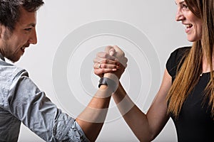 Arm wrestling, symbol of gender rivalry