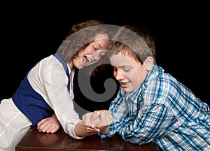 Arm-wrestling teenagers