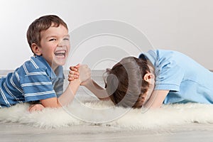 Arm wrestling and two brothers