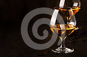 Armagnac, French grape brandy, strong alcoholic drink. Still life in vintage style, selective focus