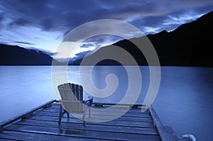 Armchair on a deck at dusk