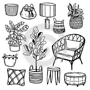 Armchair and indoor plants in baskets.