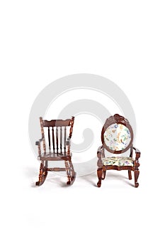 Armchair and rocking-chair isolated on white background