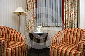 Armchairs in hotel room